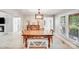 Bright dining room featuring wood table, complementary chairs, light wood flooring and modern lighting fixture at 812 Timber Creek Dr, York, SC 29745
