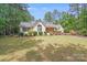 Inviting single-Gathering home with well-kept lawn, mature trees, and blooming flower beds at 812 Timber Creek Dr, York, SC 29745