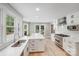 Modern kitchen with white cabinetry, stainless steel appliances, and a large center island at 812 Timber Creek Dr, York, SC 29745