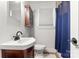 Bathroom featuring a single sink vanity, commode, medicine cabinet and tile flooring at 814 Columbia Dr, Chester, SC 29706