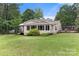 Charming home with a well-maintained lawn offers a serene setting at 814 Columbia Dr, Chester, SC 29706