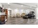 A spacious living room with wood-look floors, neutral paint and ceiling fan at 814 Columbia Dr, Chester, SC 29706
