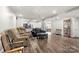 Open-plan living room with hardwood floors, neutral paint and ceiling fan at 814 Columbia Dr, Chester, SC 29706