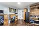 Office space filled with natural light, hardwood floors, rolltop desk, and ample storage at 814 Columbia Dr, Chester, SC 29706