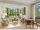 Inviting living area filled with natural light from a large bay window at 916 Cherokee Rd, Charlotte, NC 28207