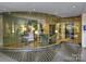 Inviting lobby with floor-to-ceiling glass windows, seating, and access to the parking garage at 916 Cherokee Rd, Charlotte, NC 28207