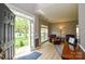 Welcoming front entry opens to a cozy living area with comfortable seating and natural light at 9713 Autumn Applause Dr, Charlotte, NC 28277