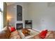 Cozy living room with fireplace, plush sofa, and warm lighting perfect for relaxing at 9713 Autumn Applause Dr, Charlotte, NC 28277