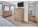 Bedroom featuring dressers, mirror, TV, and doorway at 1002 Banaba Dr, Indian Trail, NC 28079