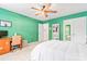 Bedroom featuring a bed, desk and chair, and green color scheme, perfect for resting or studying at 1009 Anduin Falls Dr, Charlotte, NC 28269