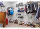 Spacious walk-in closet with plenty of shelving and storage for clothes and shoes at 1009 Anduin Falls Dr, Charlotte, NC 28269