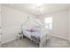 Bright bedroom with a whimsical canopy bed and soft, neutral color palette for a cozy feel at 1020 Clementine Rd, Monroe, NC 28110
