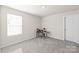 Spacious bedroom with an electronic drumset near a bright window, adding unique charm to the space at 1020 Clementine Rd, Monroe, NC 28110