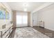 Stylish living room with light gray floors, decor, and rug, creating a modern and inviting space at 1020 Clementine Rd, Monroe, NC 28110
