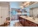Large bathroom with double vanity, tiled shower, grab bars and walk-in closet at 10836 Maryanna Ct, Charlotte, NC 28213