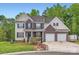 Beautiful home with a two-car garage, manicured lawn, and inviting curb appeal at 10836 Maryanna Ct, Charlotte, NC 28213