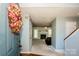 Inviting foyer leading to a comfortable living area with fireplace and neutral decor at 11024 Hunters Trace None, Charlotte, NC 28262