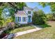 Charming two-story home with blue shutters and a well-maintained front lawn at 11024 Hunters Trace None, Charlotte, NC 28262