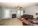 Spacious living room with a fireplace, comfortable seating, and neutral color scheme at 11024 Hunters Trace None, Charlotte, NC 28262