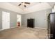 Spacious main bedroom with neutral paint, walk-in closet, and plenty of natural light at 11024 Hunters Trace None, Charlotte, NC 28262