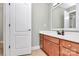Bathroom featuring a sink vanity, mirror, and neutral color scheme at 1105 Hoyle Ln, Waxhaw, NC 28173