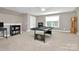 Bright game room featuring a pool table, carpeted floors, and plenty of natural light at 1105 Hoyle Ln, Waxhaw, NC 28173