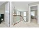 Bright hallway with modern light fixture and view of bedroom at 1105 Hoyle Ln, Waxhaw, NC 28173