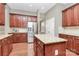 Kitchen with granite countertops, stainless steel appliances, and wooden cabinets for a modern feel at 1105 Hoyle Ln, Waxhaw, NC 28173