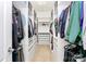 Spacious walk-in closet with built-in shelving and drawers, providing ample storage space at 1105 Hoyle Ln, Waxhaw, NC 28173