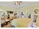 Well-appointed bedroom leads to bathroom and additional living space, enhanced by soft lighting and tray ceilings at 1119 21St Ne Ave, Hickory, NC 28601