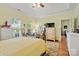 Large bedroom features tray ceilings, natural light, and a view into the adjoining bathroom and living area at 1119 21St Ne Ave, Hickory, NC 28601