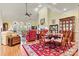 Formal dining room with elegant table, chairs, china cabinet, and a large decorative rug at 1119 21St Ne Ave, Hickory, NC 28601