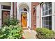 Inviting front entrance with decorative wreath, flowers, and charming details at 1119 21St Ne Ave, Hickory, NC 28601