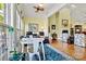 Inviting living room features an open floor plan, hardwood floors, and natural light from large windows at 1119 21St Ne Ave, Hickory, NC 28601