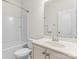 Bright bathroom with a shower-tub combo and a vanity with a sink at 112 Serravista St, Mooresville, NC 28117