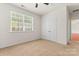 Neutral bedroom with carpet, a ceiling fan, and a window providing natural light at 112 Serravista St, Mooresville, NC 28117