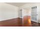 Versatile office space with hardwood floors and French doors leading to a room beyond, perfect for a home office at 112 Serravista St, Mooresville, NC 28117