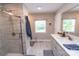 Modern bathroom featuring a glass-enclosed shower, vanity, and stylish decor at 1165 Old Salisbury Concord Rd, Concord, NC 28025