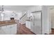 Spacious kitchen with stainless steel refrigerator, granite countertops, and hardwood floors at 12404 Mcallister Park Dr, Charlotte, NC 28277