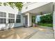 Covered patio with concrete flooring and white siding, perfect for outdoor entertaining at 12404 Mcallister Park Dr, Charlotte, NC 28277