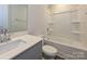 This bathroom features a tub and shower combination, toilet, and vanity at 1441 31St Ne St, Conover, NC 28613