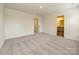 A blank bedroom features a doorway and entry to a bathroom at 1441 31St Ne St, Conover, NC 28613