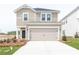 Inviting two-story home with a neutral-toned exterior, a two-car garage, and a well-maintained front yard at 1441 31St Ne St, Conover, NC 28613