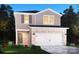 Charming two-story home featuring a brick and siding exterior with a two-car garage and well-manicured landscaping at 1441 31St Ne St, Conover, NC 28613