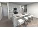 Stylish kitchen featuring a large island with seating, modern appliances, and sleek white cabinetry at 1441 31St Ne St, Conover, NC 28613