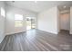 Bright living room featuring hardwood floors, sliding glass doors, and ample natural light, creating a welcoming atmosphere at 1441 31St Ne St, Conover, NC 28613