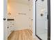 Bathroom featuring a modern walk-in shower, white vanity, and updated hardware at 164 Hillndale Ln, Statesville, NC 28677