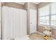 This bathroom features a large shower and a bright window at 2003 Dataw Ln, Indian Trail, NC 28079
