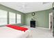 Light and bright, this bedroom has a ceiling fan and light, a window, and a dresser at 2003 Dataw Ln, Indian Trail, NC 28079