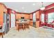 Bright kitchen boasts stainless steel appliances, center island with seating, and casual dining area at 2003 Dataw Ln, Indian Trail, NC 28079
